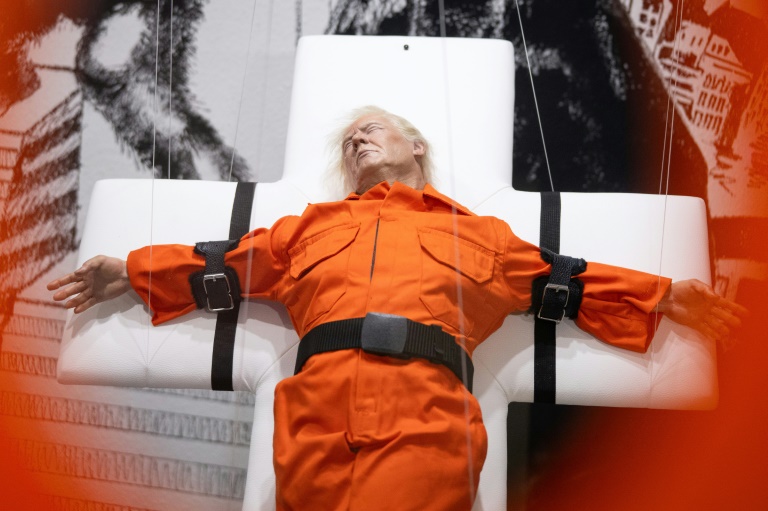 Sculpture Of Trump Strapped To A Cross Displayed In Switzerland Sculpture Of Trump Strapped To A Cross Displayed In Switzerland