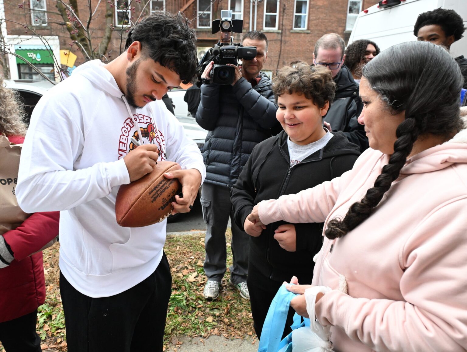 A community gift: Heartwing Center and Patriots' Borregales team up for turkey giveaway