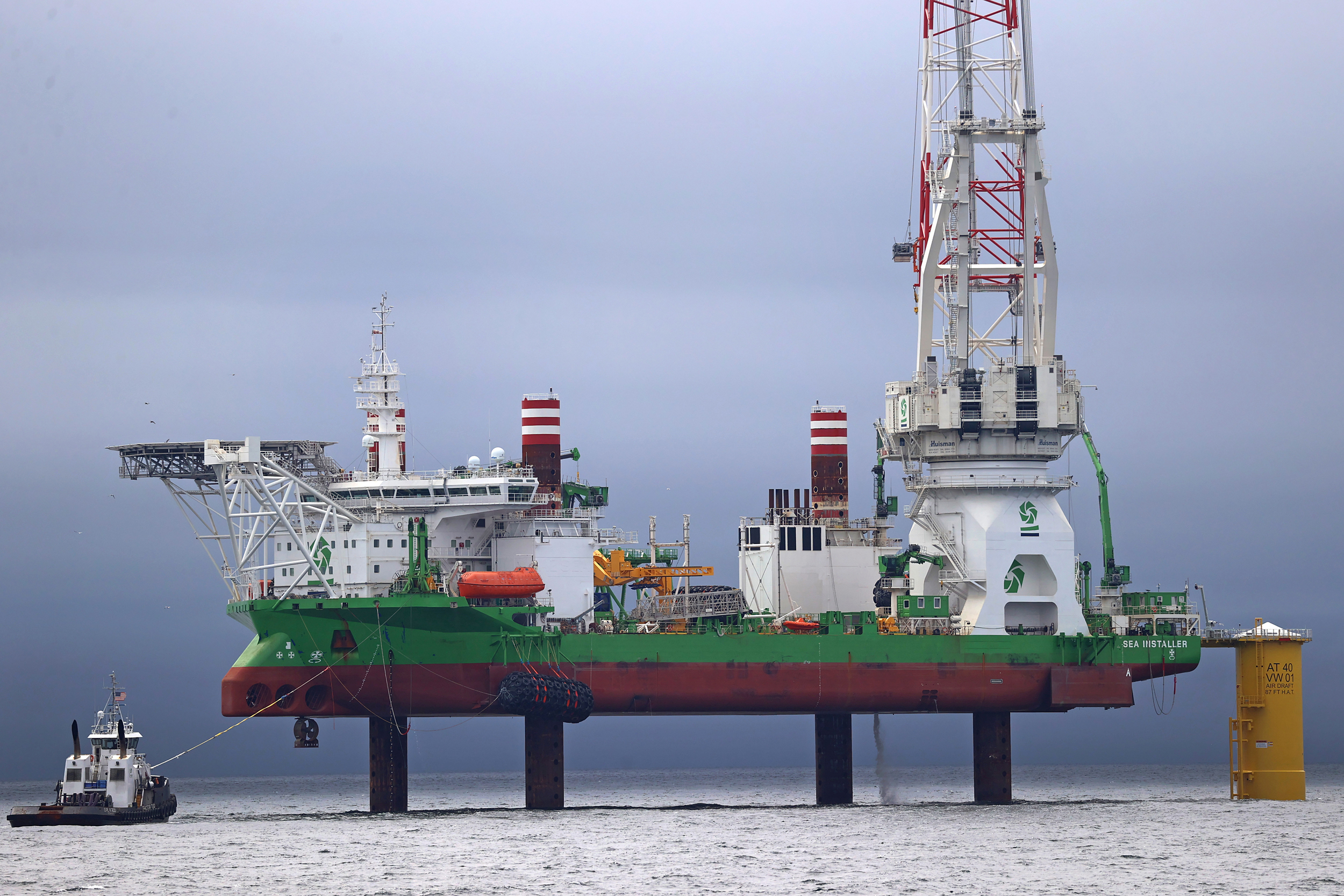 A view of an offshore wind turbine installation jack-up vessel called the Sea Installer on Aug. 17, 2023, in New Bedford, Mass. Credit: David L. Ryan/The Boston Globe via Getty Images
