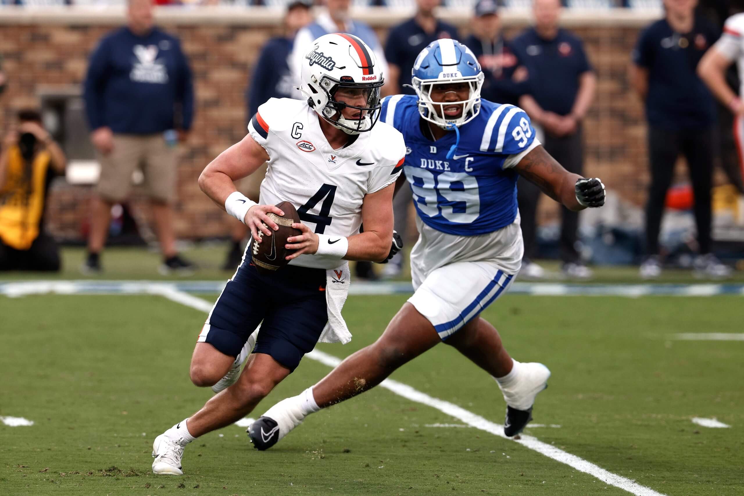 Chandler Morris run right to escape a defender in the backfield. 