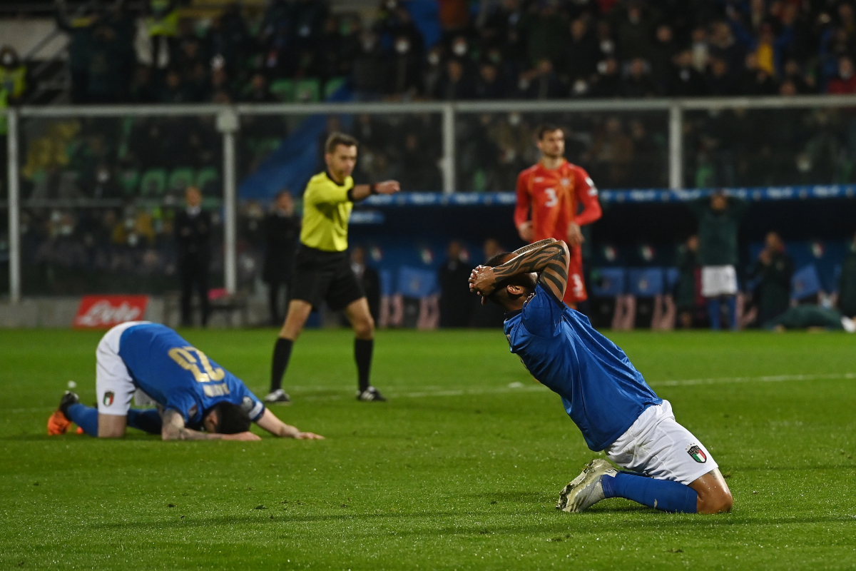 PALERMO, ITALY - MARCH 24: Alessandro Bastoni and Joao Pedro Galvao of Italy look dejected during the 2022 FIFA World Cup Qualifier knockout round play-off match between Italy and North Macedonia at Renzo Barbera Stadium in Palermo, Italy. (Photo by Tullio M. Puglia/Getty Images)