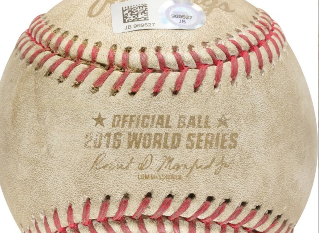 Bidding is open for several Cleveland sports items including three 2016 World Series balls.
