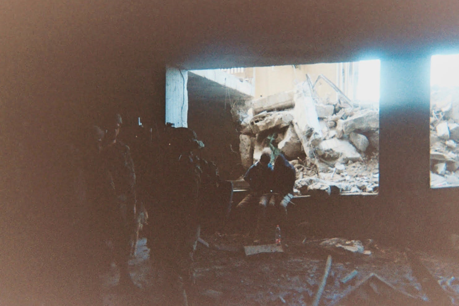 This photo provided by Breaking the Silence, a whistleblower group of former Israeli soldiers, shows two detainees used as human shields being held inside a house in the Gaza City area in 2024.