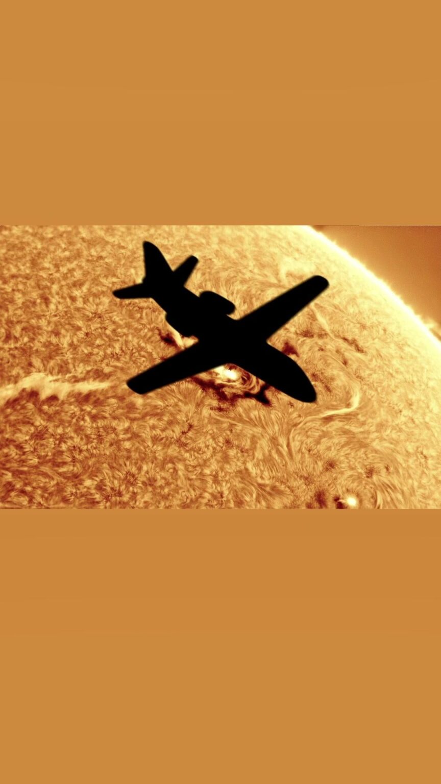 Plane crossing the sun