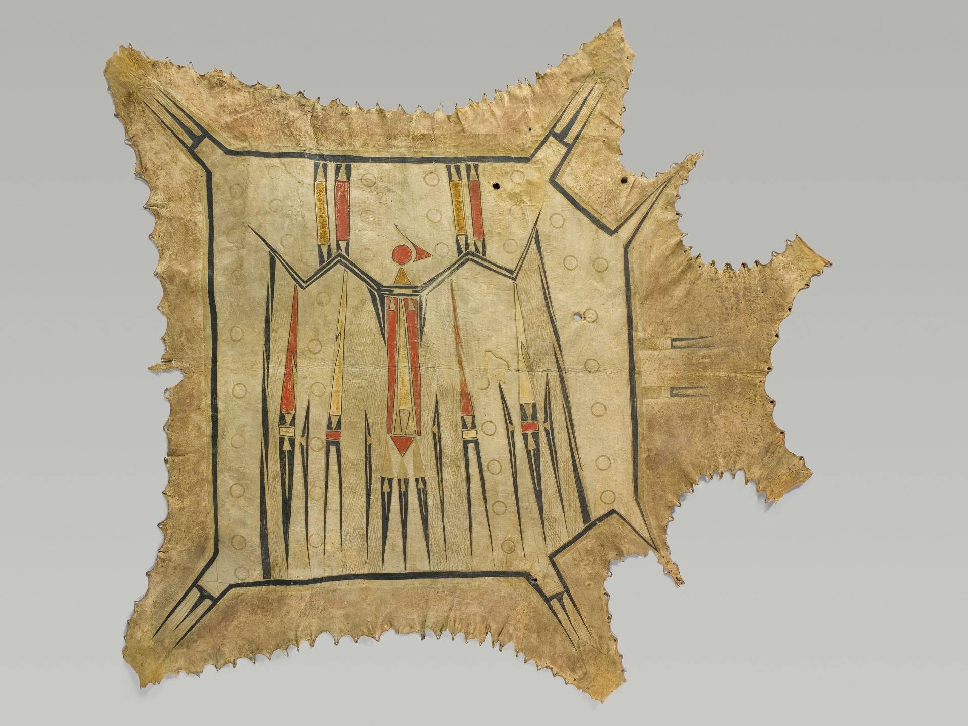 An Indigenous painted deer hide robe from the collection features sharp, angular red and black lines to depict Peoria artistic traditions and stories