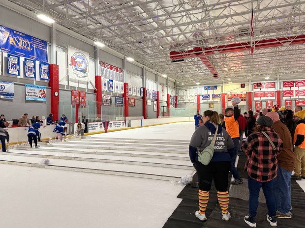 Teams of four bowled with turkeys on the ice at...