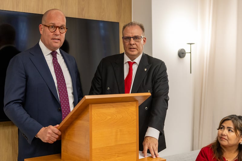 Elder James W. McConkie — second counselor in the Europe Central Area Presidency, left — speaks to members and friends of the Church assembled in person and throughout Poland via broadcast during a dedicatory session of the new Nowy Świat visitors’ center in Warsaw, Poland, on Monday, August 25, 2025.