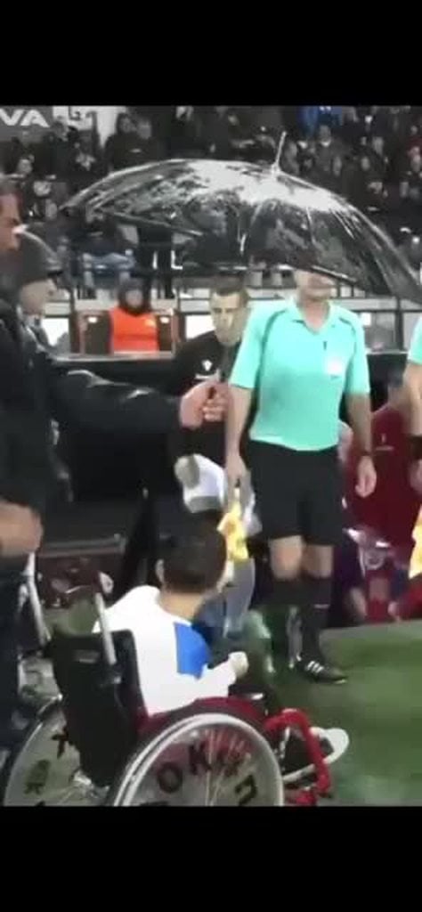 We introduce culture: Soccer player carries a young disabled fan so he can high five everyone
