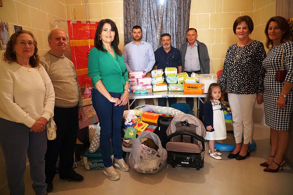Members of the chapter during a donation to the Life Network Foundation in May 2024.