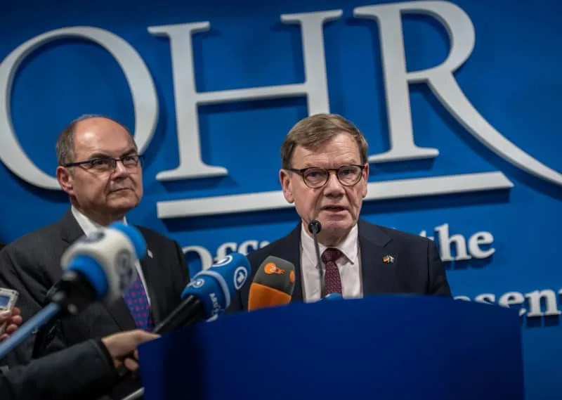 Germany's Foreign Minister Johann Wadephul (R) stands with Christian Schmidt, High Representative of the International Community in Bosnia-Herzegovina, during his Western Balkans tour. The EU has offered accession prospects to the region-including Albania, Bosnia-Herzegovina, Kosovo, North Macedonia, Montenegro, and Serbia-since 2003. Michael Kappeler/dpa