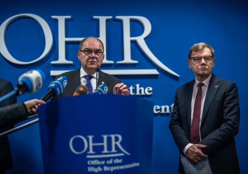Germany's Foreign Minister Johann Wadephul (R) stands with Christian Schmidt, High Representative of the International Community in Bosnia-Herzegovina, during his Western Balkans tour. The EU has offered accession prospects to the region-including Albania, Bosnia-Herzegovina, Kosovo, North Macedonia, Montenegro, and Serbia-since 2003. Michael Kappeler/dpa