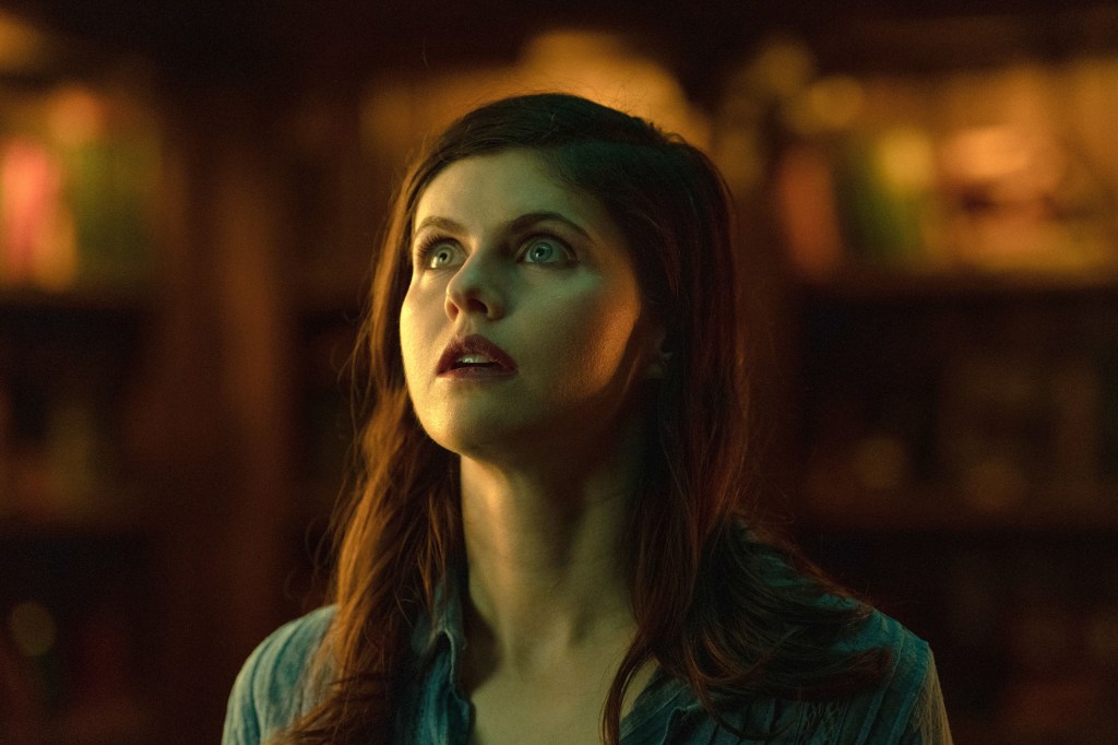 Alexandra Daddario as Rowan Mayfair looking up with an open mouth in "Mayfair Witches."