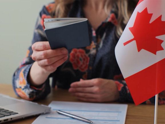 Unlike Australia, Canada continues to implement its long-term immigration plan Unlike Australia, Canada continues to implement its long-term immigration plan