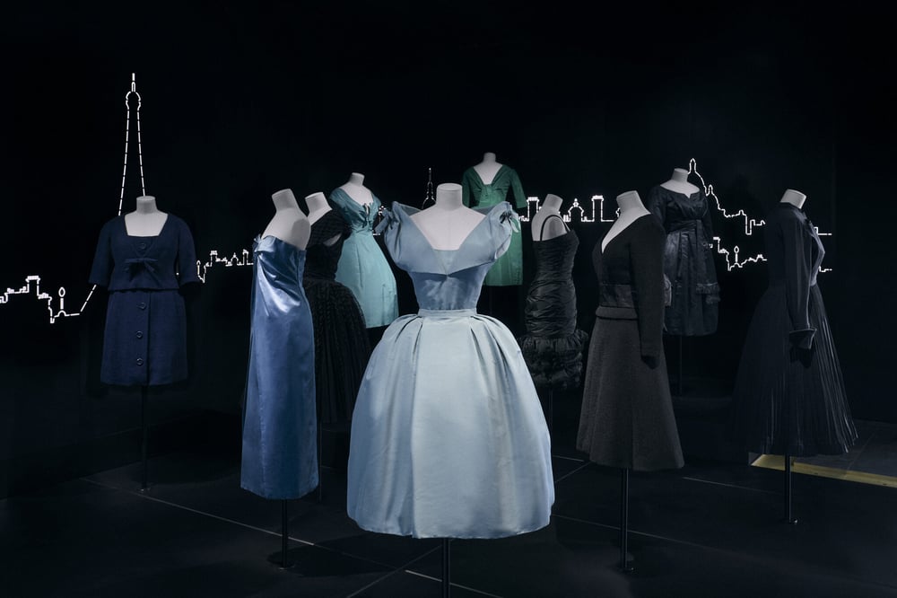 Dior's signature nipped-in waist and sculptural silhouettes