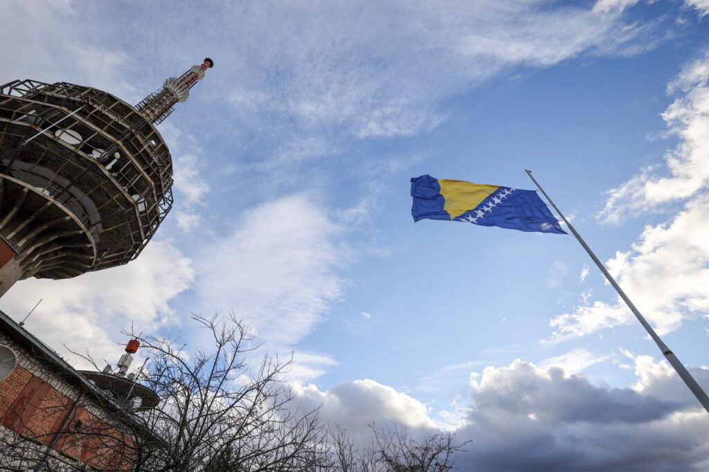 The national flag of Bosnia and Herzegovina is raised during a ceremony on Mount Hum to commemorate Statehood Day. Sarajevo, Bosnia and Herzegovina, November 25, 2025. (AA Photo)