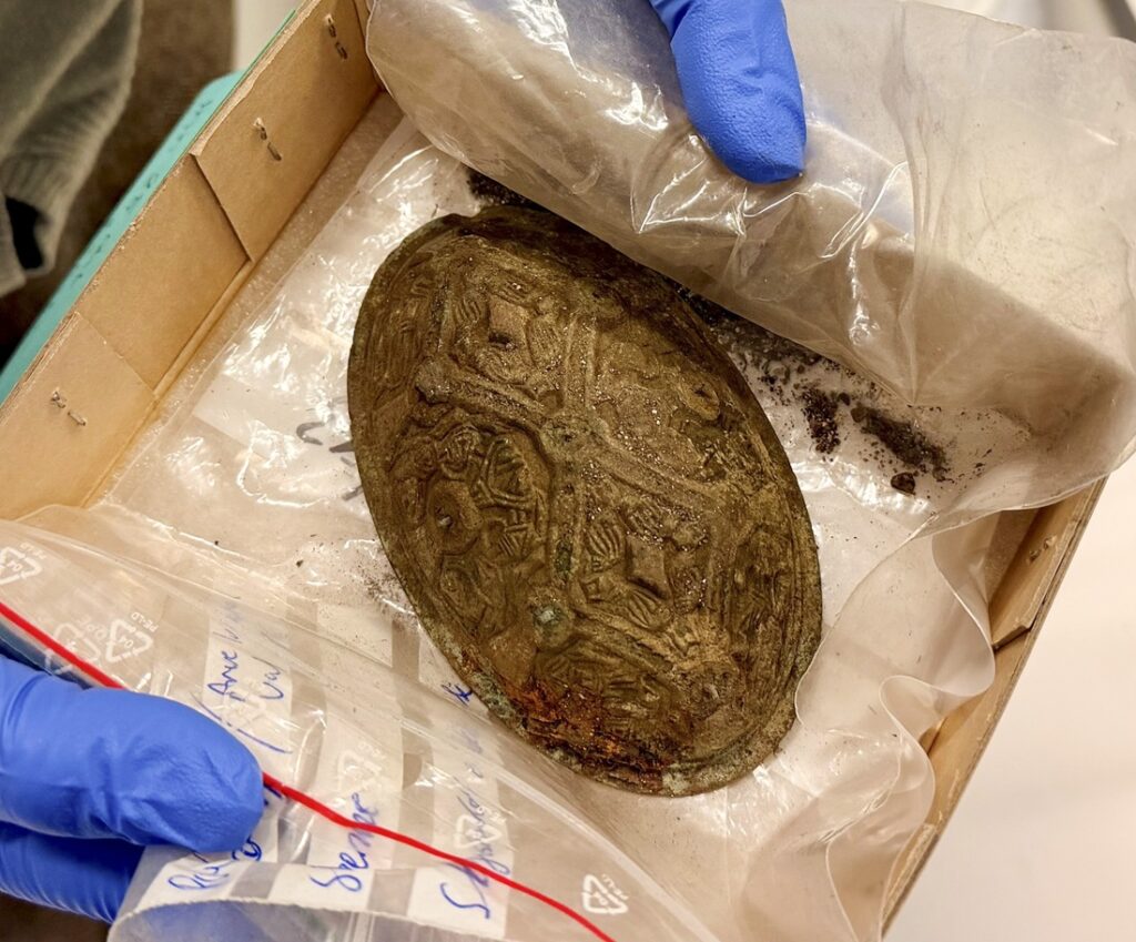 This beautiful bowl-shaped brooch is among the objects found in the grave. Credit: Raymond Sauvage, NTNU University Museum
