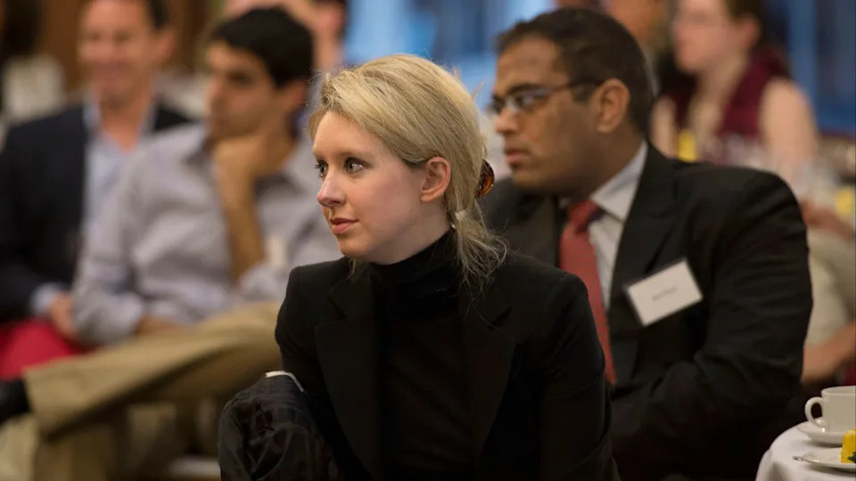 Elizabeth Holmes, the chief executive officer and founder of Theranos, a health care technology company, listens as Deputy Secretary of Defense Ash