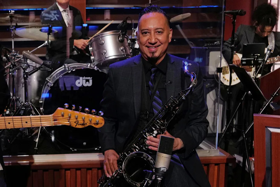 This image released by Disney shows Cleto Escobedo on the set of 