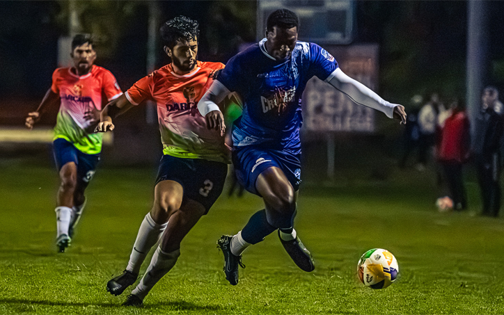 Players from Capital City Islanders (blue) and MoCo 1776 FC battle for the ball in a Round 2 match in the 2026 US Open Cup qualifying tournament. Photo: Hayli Akakpo-Martin
