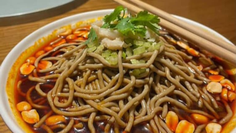 We ordered dumplings, noodles, lemon chicken, tofu, barbecue pork buns, durian rolls, stewed peanuts, and Peking duck.