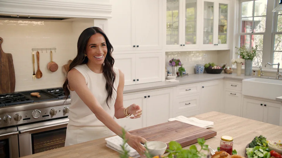 A photo of Meghan Markle in a kitchen.