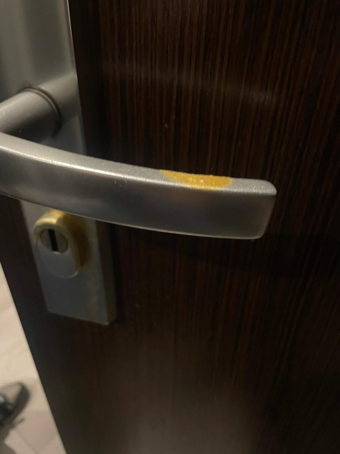 After a few days we got back to our apartment in Poland and found this weird substance on the door handle and the lock... what is that?