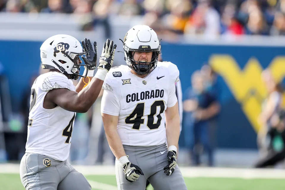 Nov 8, 2025; Morgantown, West Virginia, USA; Colorado Buffaloes linebacker Shaun Myers (40) celebrates a tackle for a loss during the second quarter against the West Virginia Mountaineers at Milan Puskar Stadium. Mandatory Credit: Ben Queen-Imagn Images