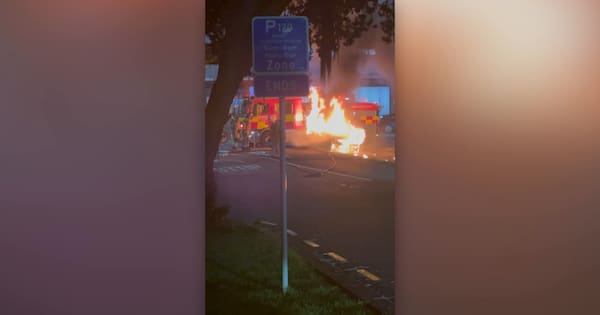 Flaming car rolls down hill into fire truck in Auckland