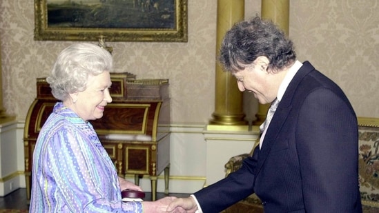 Queen Elizabeth II with Sir Tom Stoppard at Buckingham Palace in 2000 when he was awarded the Order of Merit.