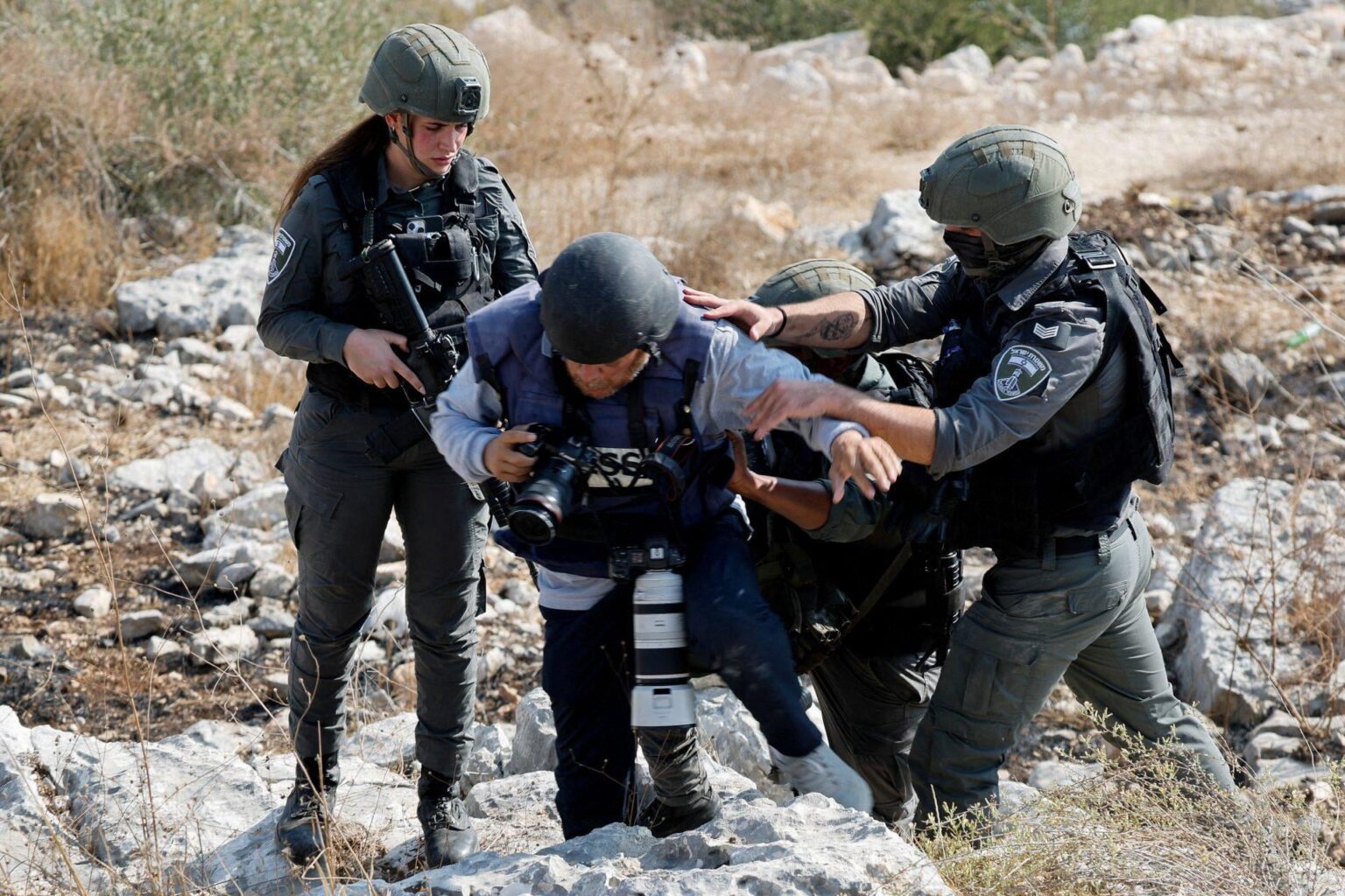 West Bank: Israeli settlers violently attack Palestinians and Reuters journalists