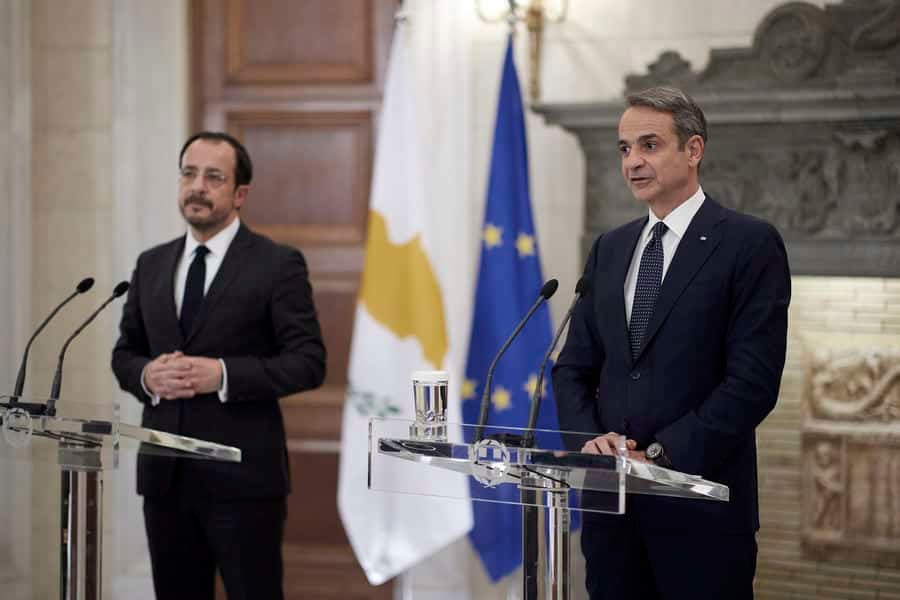 Greek Prime Minister Kyriakos Mitsotakis (R) and President of the Republic of Cyprus Nicos Christodoulides (L) make joint statements after their meeting.