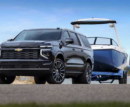 2024 Chevrolet Suburban in black towing