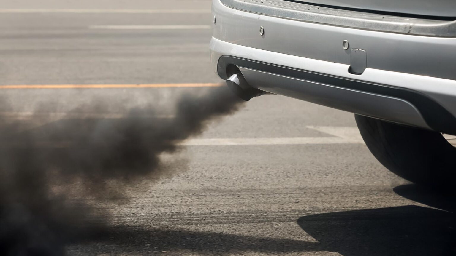 Vehicles spewing exhaust