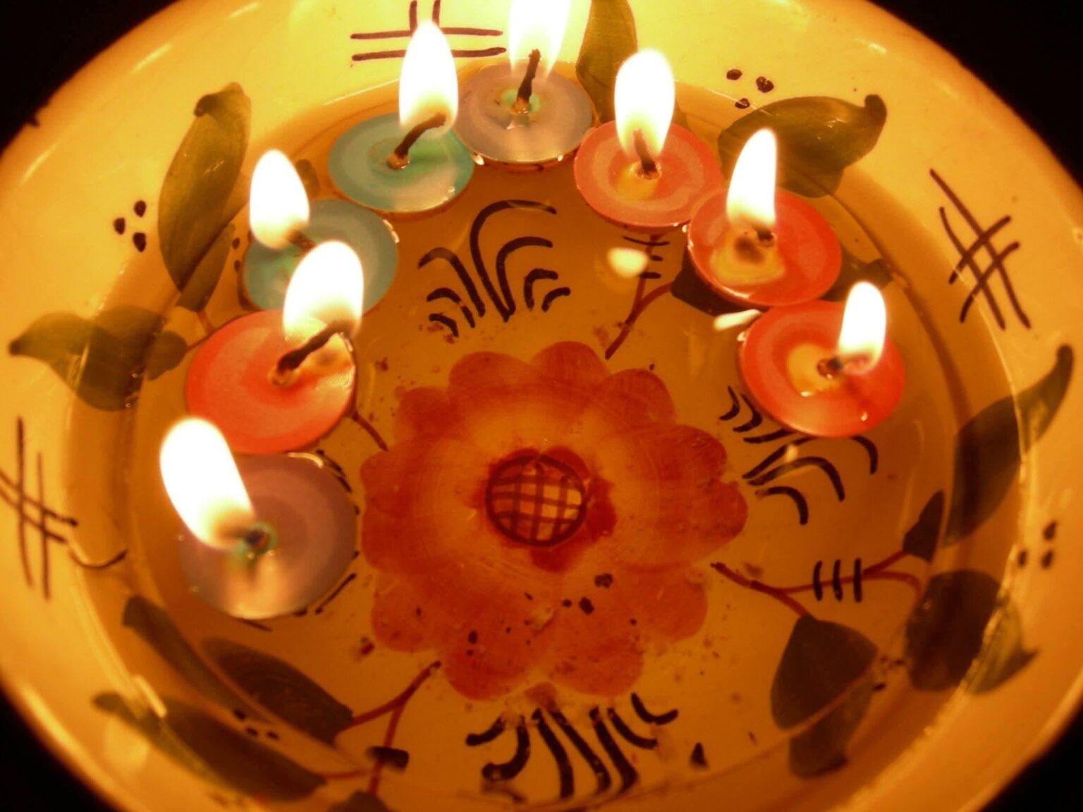 On All Saints' Day and All Souls' Day in Spain, the Night of the Souls is celebrated by placing a candle called a butterfly candle for each deceased person, floating in water and oil so that the soul of the deceased may return for as long as the flame lasts.