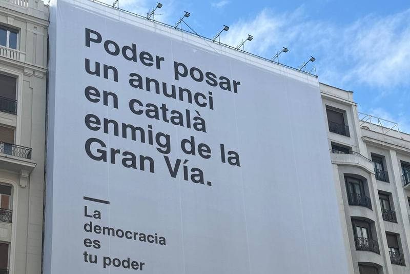 Spain defends large Catalan banner in Madrid marking 50 years since end of dictatorship