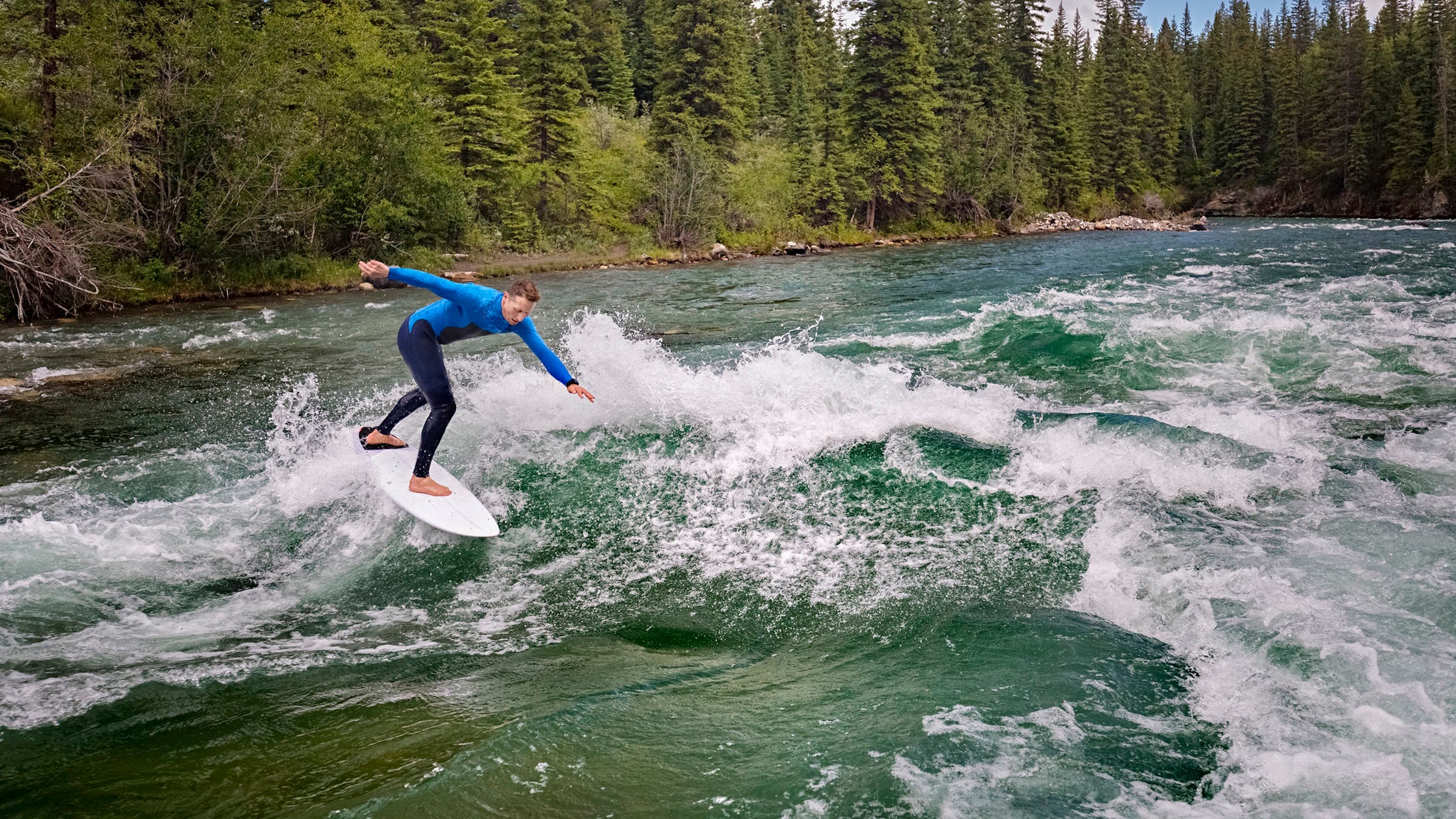 man surfing river