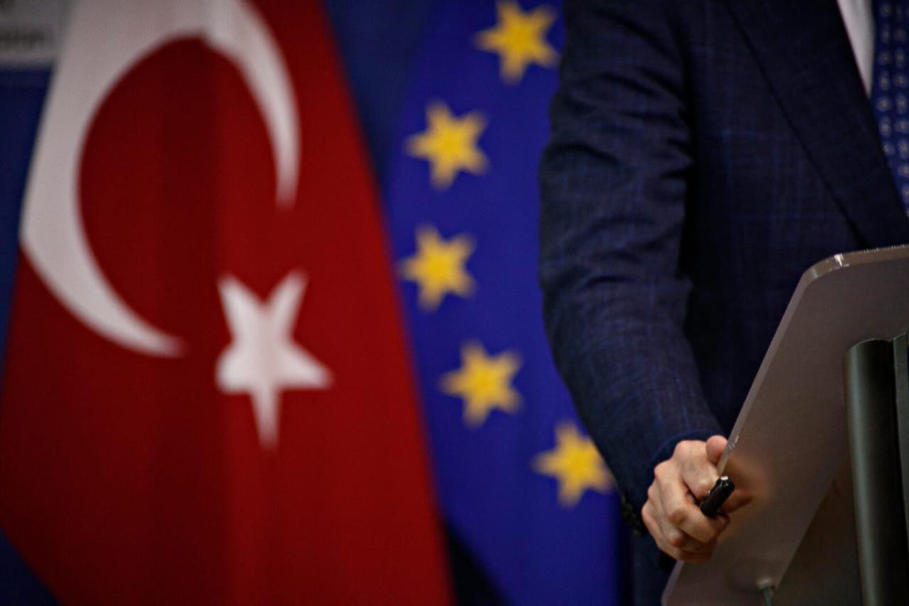 A person stands next to flags of the European Union and Türkiye at the headquarters of the European Commission in Brussels, Belgium, July 25, 2017. (AFP Photo)