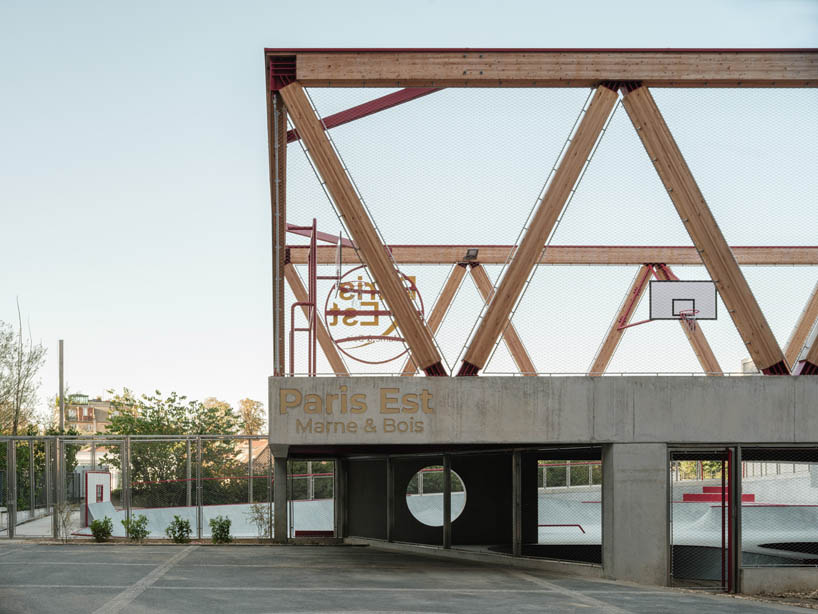 cantilever sports court crowns urban skatepark bowl along railway in france