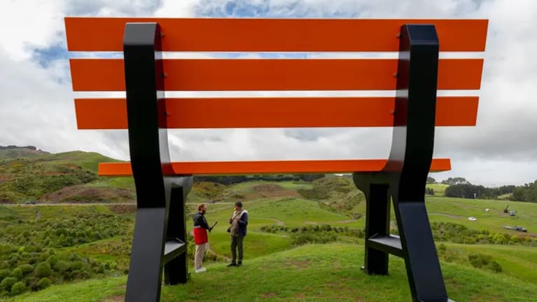 The massive park bench was inspired by the normal-sized benches that dot the 9-hole golf course on the property.