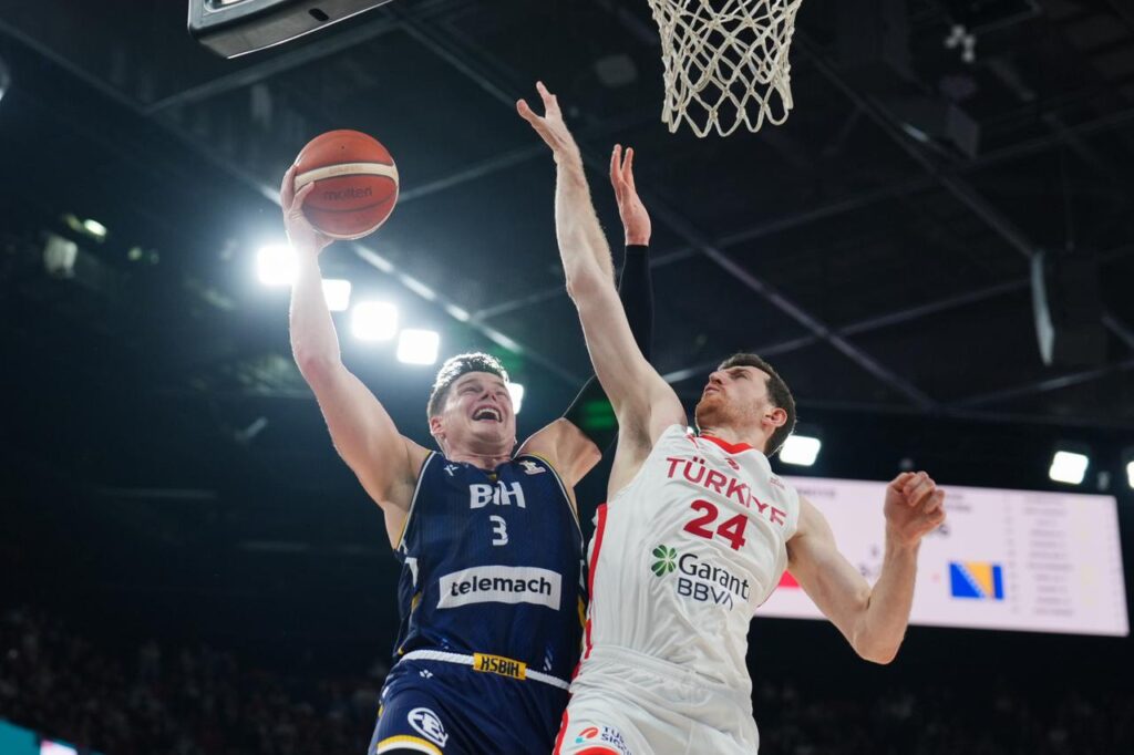 Turkiye’s Ercan Osmani (24) in action against Amar Alibegovic of Bosnia and Herzegovina during the 2027 FIBA World Cup European Qualifiers first round Group C match between Türkiye and Bosnia and Herzegovina at the Turkcell Basketball Development Center in Istanbul, Türkiye, November 27, 2025. (AA Photo)