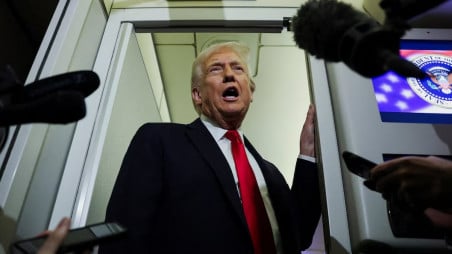 US President Donald Trump speaks to reporters aboard Air Force One during travel to Palm Beach, Florida, from Joint Base Andrews, Maryland, US, November 25, 2025. Photo: REUTERS/Anna Rose Layden/File Photo