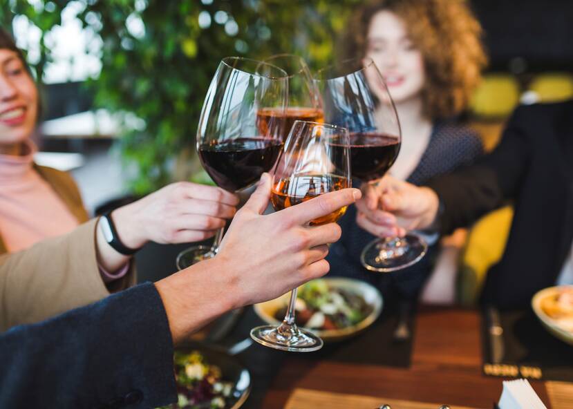 People drinking wine