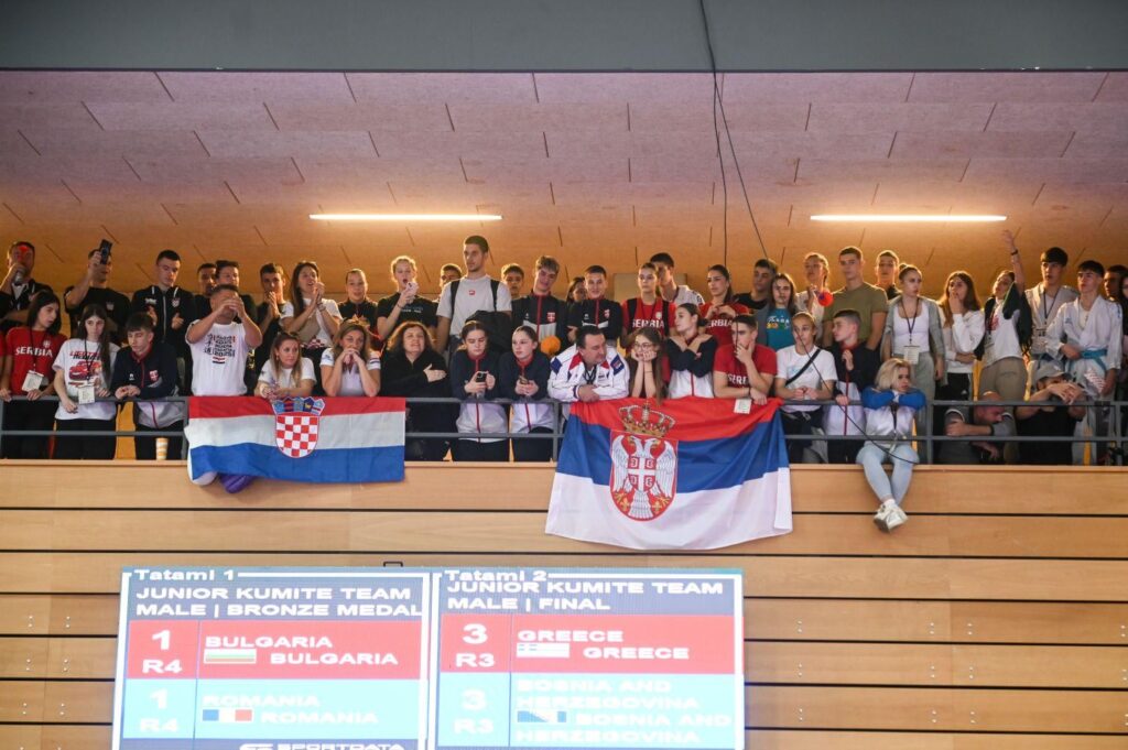 PHOTO The best message to masked people. Young Croatian and Serbian karate players raised both flags and cheer today - together