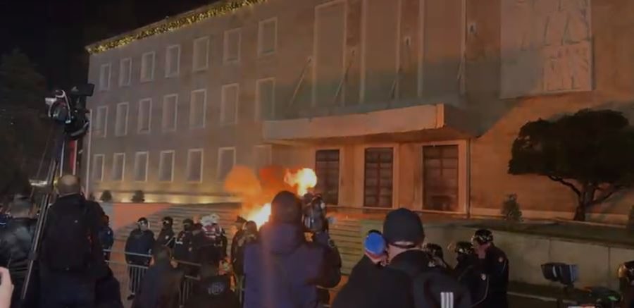 The situation escalates, a Molotov cocktail is thrown at the door.