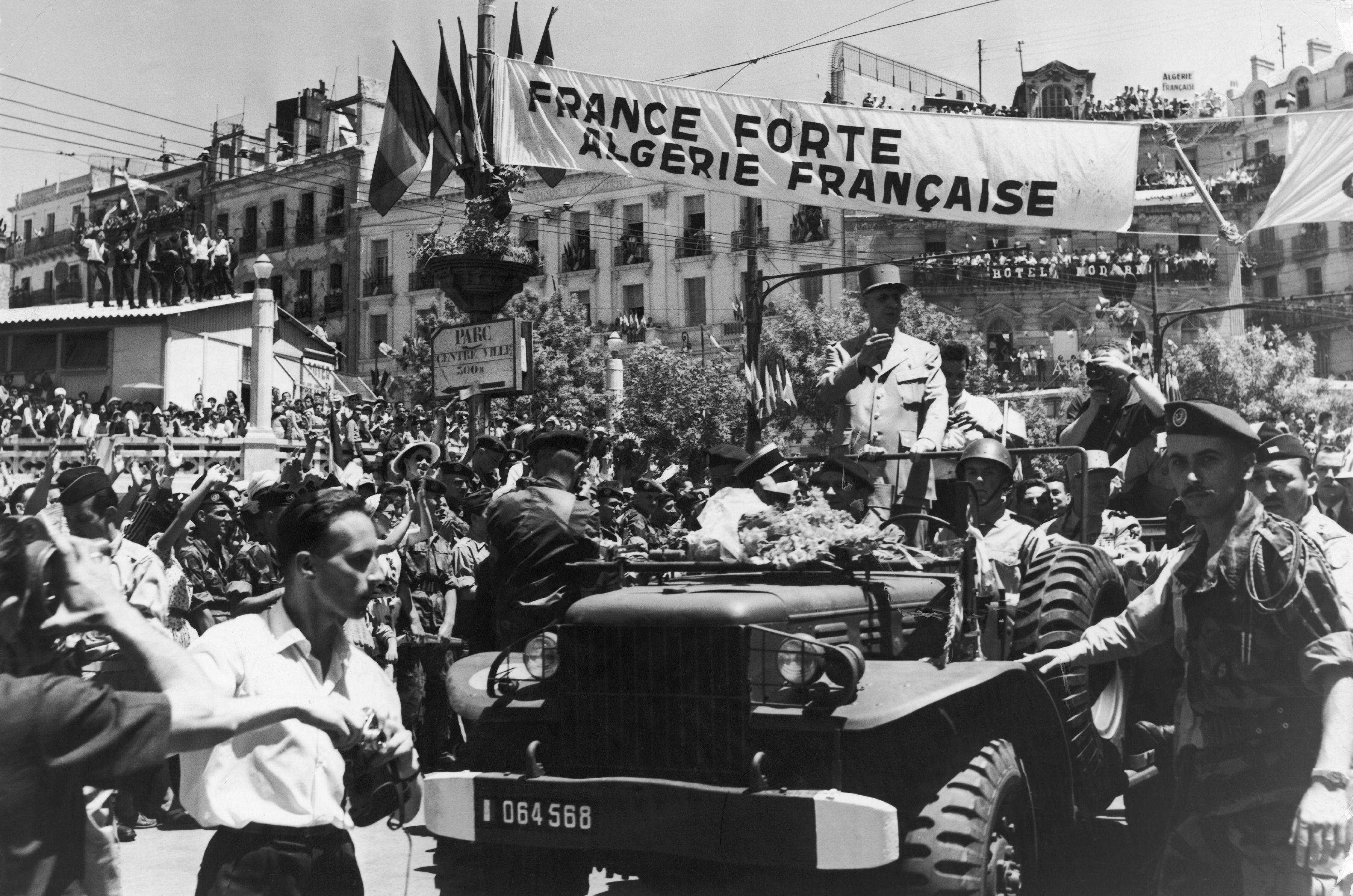General De Gaulle in Algiers in 1958 during a march for a French Algeria.