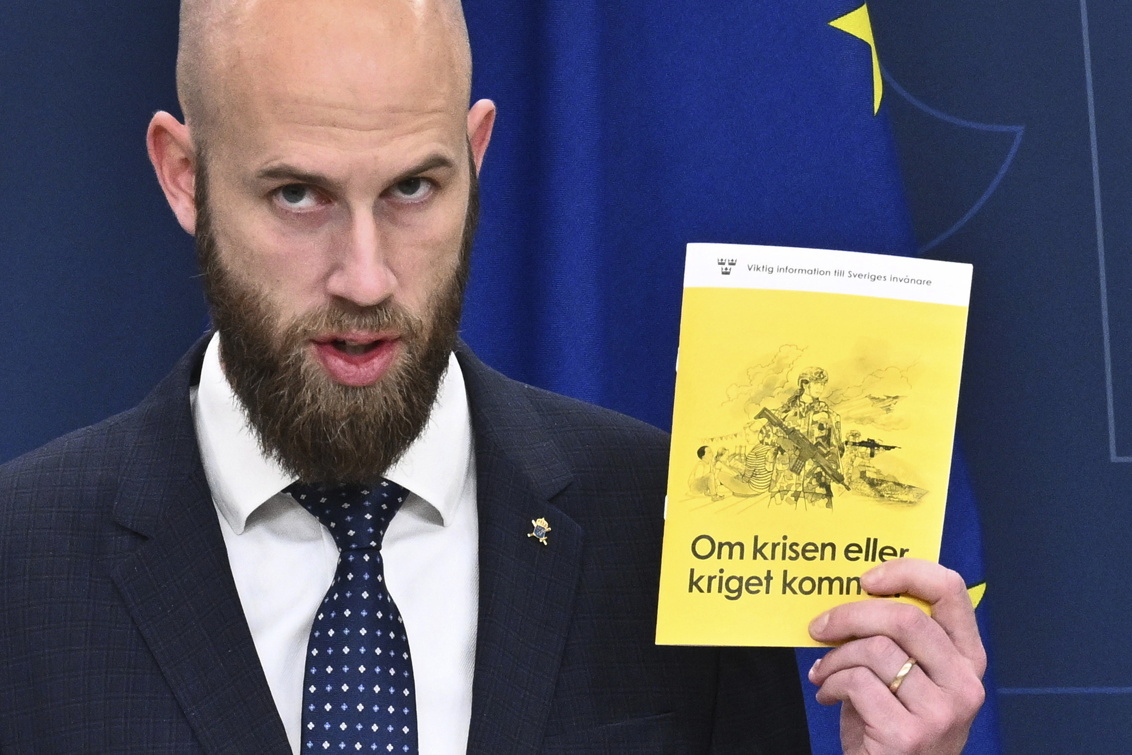Sweden's Minister for Civil Defence Carl-Oskar Bohlin presents the booklet "If Crisis or War Comes."