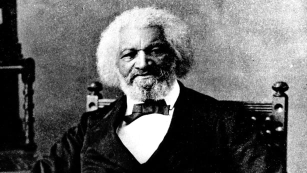 A black and white photograph of American abolitionist Frederick Douglass