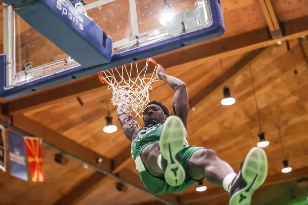Ireland's Sam Alajiki scores a slam dunk