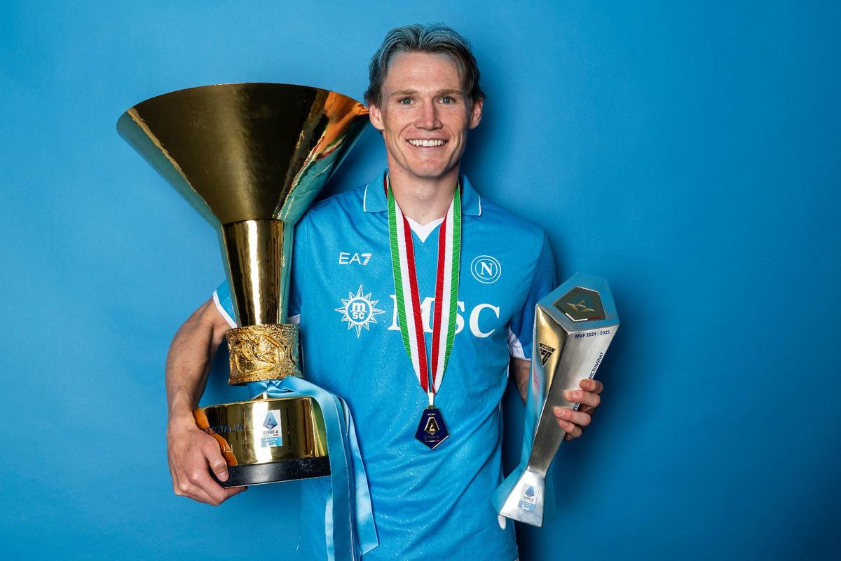 Scott McTominay of SSC Napoli poses for a photo with the Serie A scudetto title trophy and the Serie A Season 24/25 MVP Trophy 