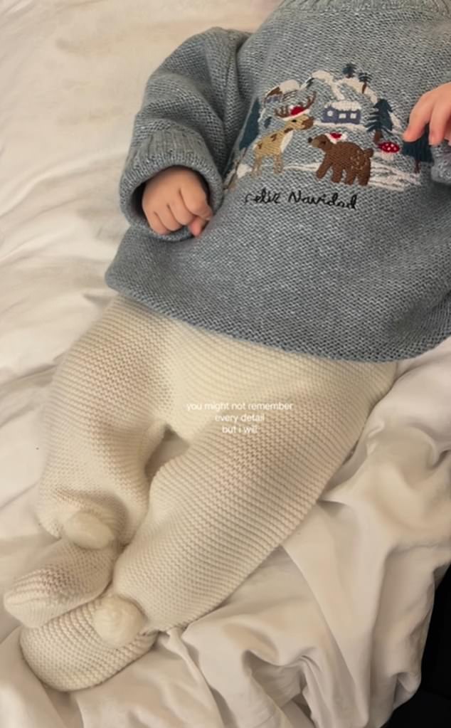 She also shared a look at her baby boy, posting a picture of him wearing a 'Feliz Navidad' jumper